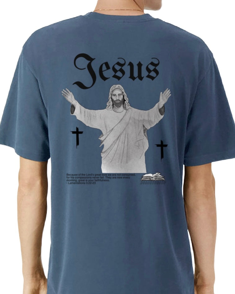 Blue t-shirt with a graphic of Jesus on the back, displayed on a person.